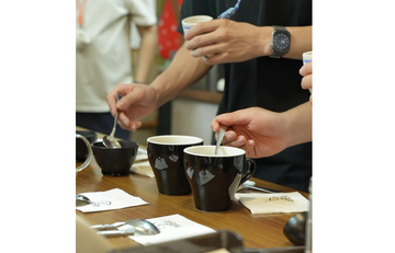 Sensory calibration exercise with Devil Water during STARESSO 10K Tastes event to train palate for coffee flavor analysis
