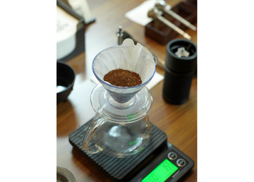 close-up of STARESSO D9+ manual coffee grinder showing multi-burr configuration for flavor control
